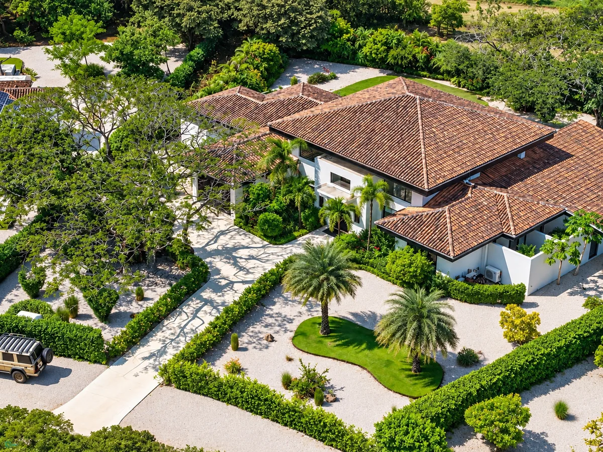 Aerial view of a Hacienda Pinilla residence and landscaped entrance