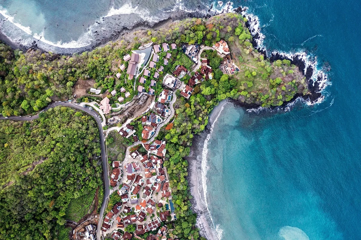 Aerial view of the Pacific coastline and homes